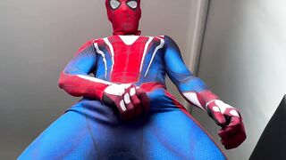 Horny Spiderman shoots thick ropes of gay cum on suit while edging handjob