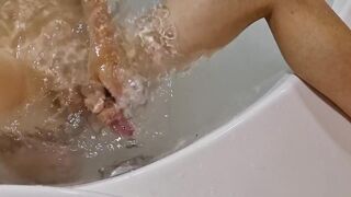 Gushing in the Jacuzzi While Masturbated by the Whirlpool