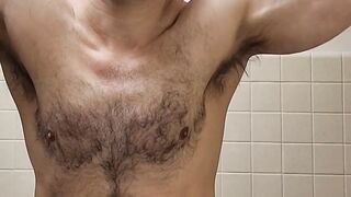 Flexing hairy muscle bear in tank top destroyed in gay body worship