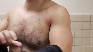 Flexing hairy muscle bear in tank top destroyed in gay body worship