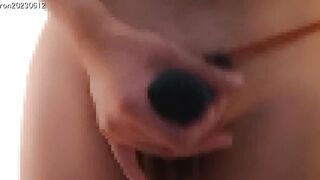 Japanese guy jerks off in pants with balls popping out