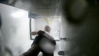 Big dick boy jerks off in speedo shower leaking cum all over