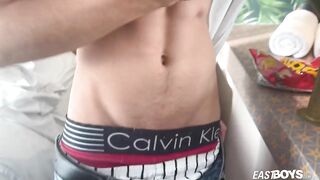Tight latino twink strips down his big cock in shower