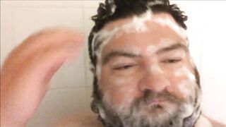 Bearded brute gets soaked in steamy solo shower mess