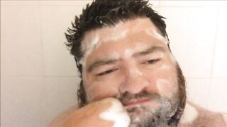 Bearded brute gets soaked in steamy solo shower mess