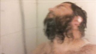 Bearded brute gets soaked in steamy solo shower mess