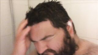 Bearded brute gets soaked in steamy solo shower mess