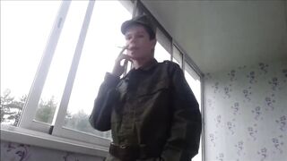 Russian soldier smokes spits jerks his cock cumming all over his army boots