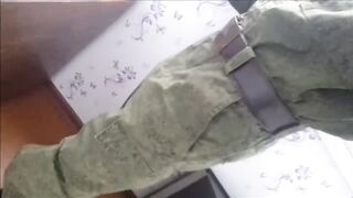 Russian soldier smokes spits jerks his cock cumming all over his army boots