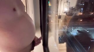 Married chubby guy jerks off naked near hotel window