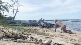 Pet play at the beach with a risky gay exhibitionist