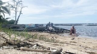 Pet play at the beach with a risky gay exhibitionist