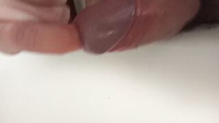 Gaping his peehole while pissing huge cock stuffed inside
