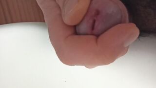 Gaping his peehole while pissing huge cock stuffed inside