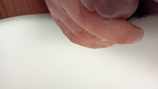 Gaping his peehole while pissing huge cock stuffed inside