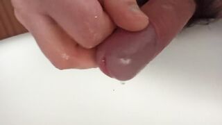 Gaping his peehole while pissing huge cock stuffed inside