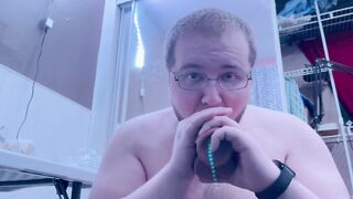 Chubby bear takes big black dildo deep throat