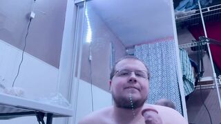 Chubby bear takes big black dildo deep throat