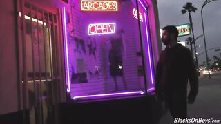 Bearded white man slurping black cock at gloryhole