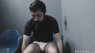 Bearded white man slurping black cock at gloryhole