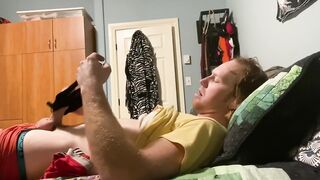 Roommate's panties wrapped around ginger uncut cock as he jerks off and gushes cum all over them.