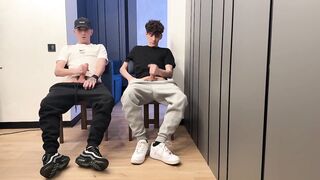 Two lads jerking off uncut dicks with big cum loads