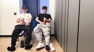 Two lads jerking off uncut dicks with big cum loads