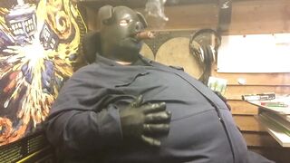 piggin around with a chubby latex hood guy
