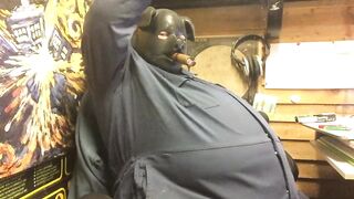 piggin around with a chubby latex hood guy