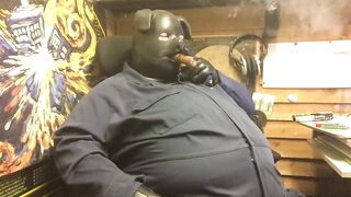 piggin around with a chubby latex hood guy