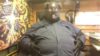 piggin around with a chubby latex hood guy