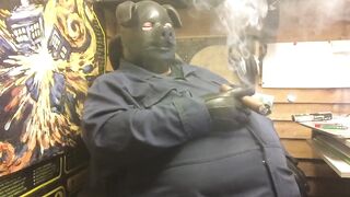 piggin around with a chubby latex hood guy