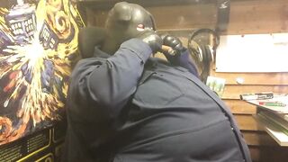 piggin around with a chubby latex hood guy