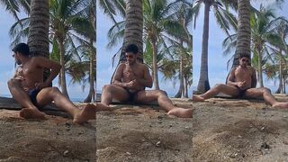 Athletic guy jerking off in public cumming on Caribbean beach