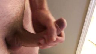 Hairy guy strokes veiny cock until cum drips thick and heavy