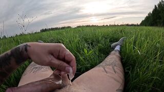 Tattooed Stud Gushes Massive Sperm Fountain In Sunset Field