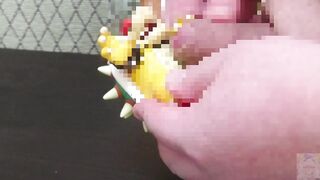 Bowser figure ruined by gay solo cum shots