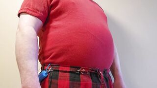 Big red balloon blown by gay belly fetish inflation