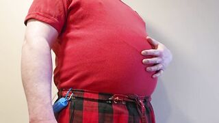 Big red balloon blown by gay belly fetish inflation