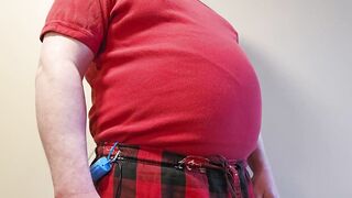Big red balloon blown by gay belly fetish inflation