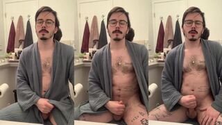 Bulging robe and jerking off hairy inked gay alone