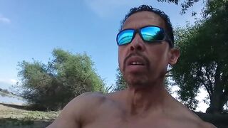 Muscular exhibitionist masturbating naked outside in front of shocked onlookers
