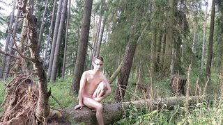 Twink strips naked in the forest smears mud all over his tight body