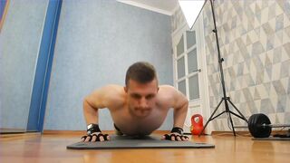 Muscular hunks destroy floor push-ups in tight speedo