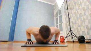 Muscular hunks destroy floor push-ups in tight speedo