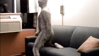 Snake in a spandex morphsuit jerks off in hotel room alone