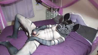 Hyena boy tears his fursuit stroking his uncut cock raw solo